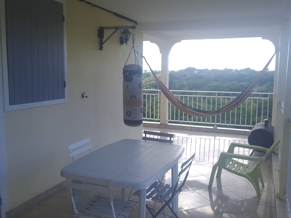 Comfort House, Balcony, Garden View | Outdoor dining