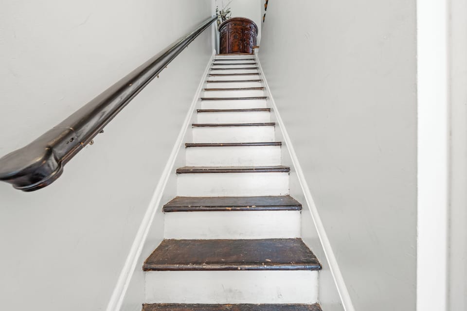 Charming staircase with classic wood steps and vintage character