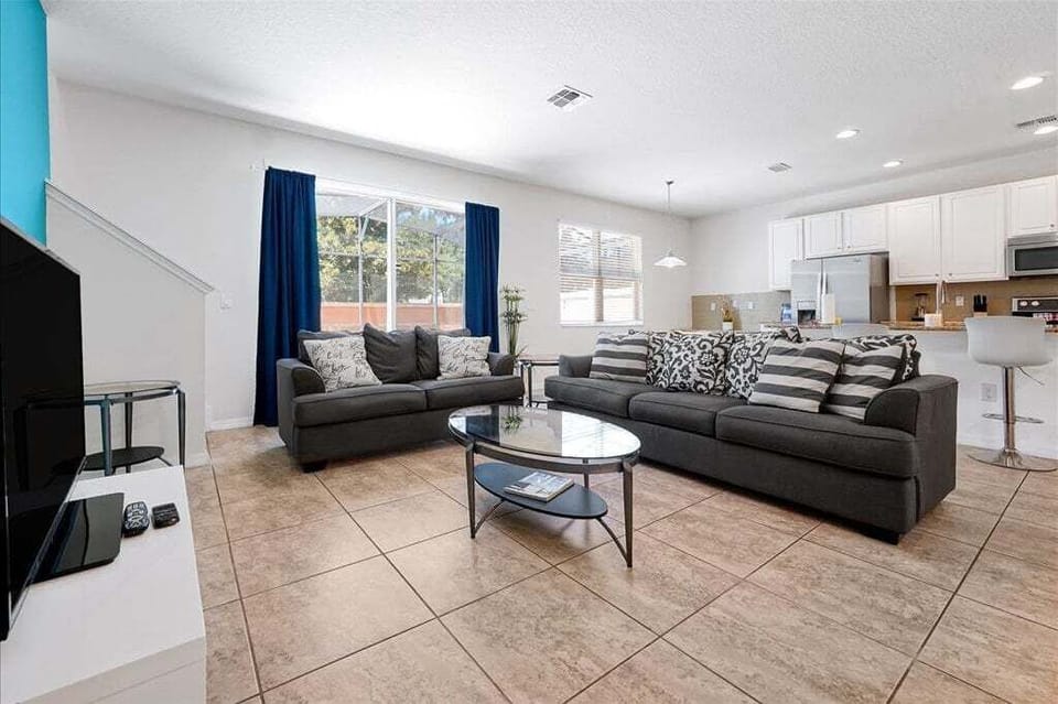 Gather, relax, and make unforgettable memories in our large, open-concept living room designed with comfort in mind.