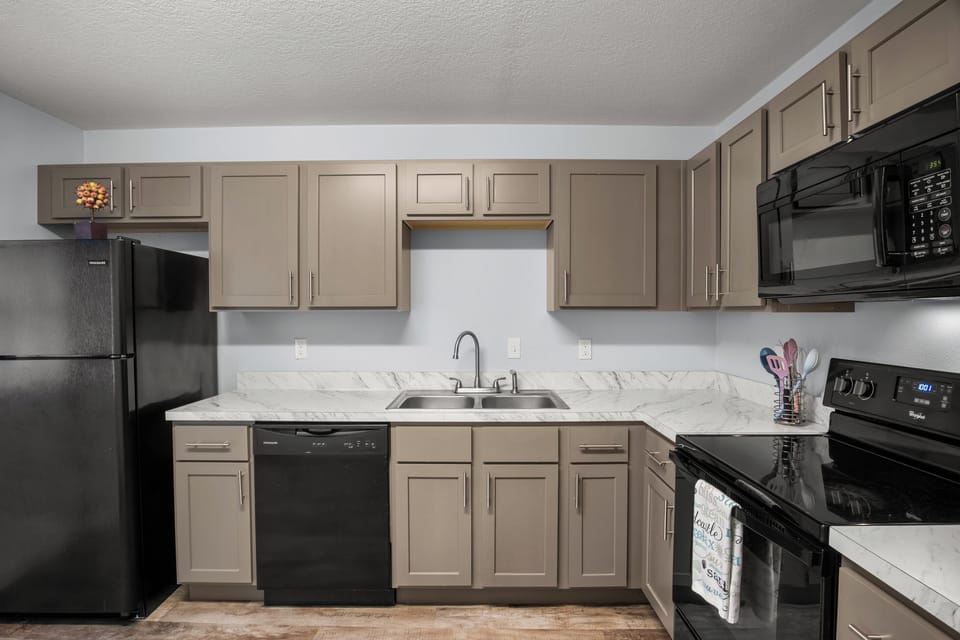 Kitchen dishwasher & refrigerator.