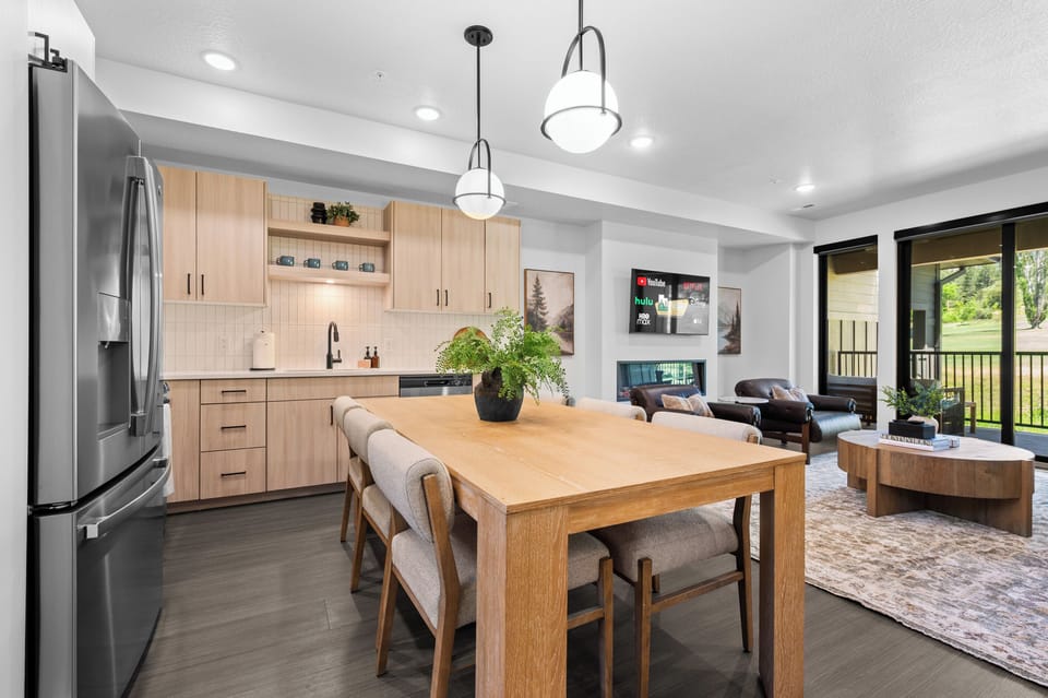 Open dining area with easy access to the living area and balcony