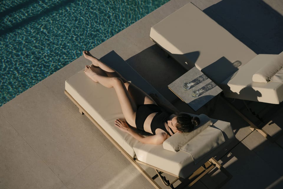 Peaceful countryside enhances every moment by the elegant infinity pool.