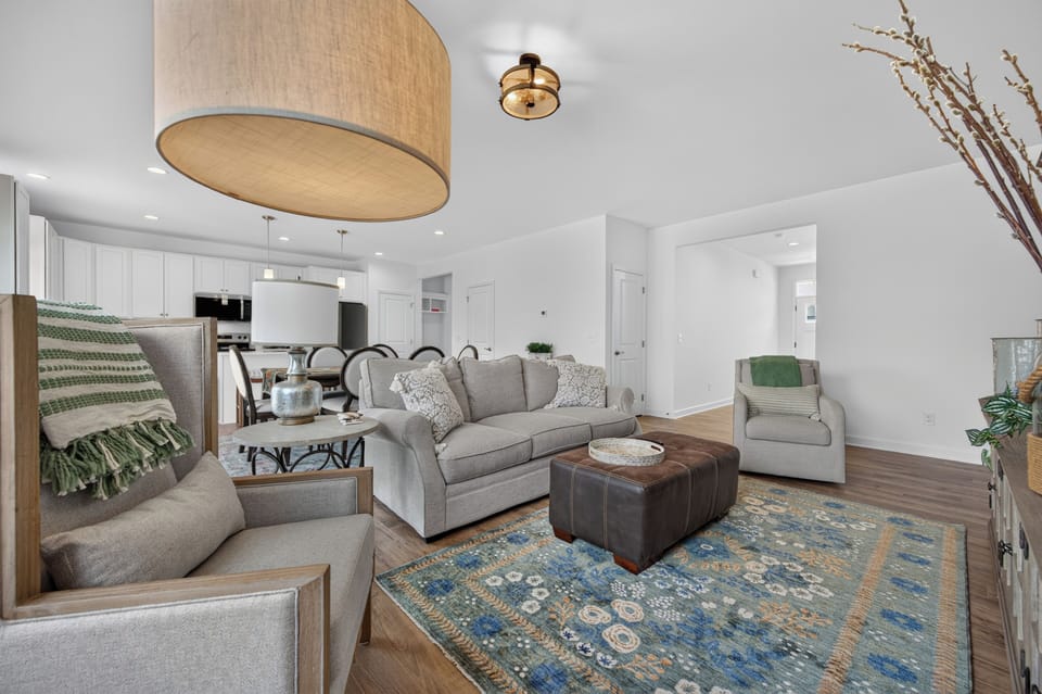 Unwind in the inviting open-concept living room, thoughtfully designed for relaxing and spending time together.