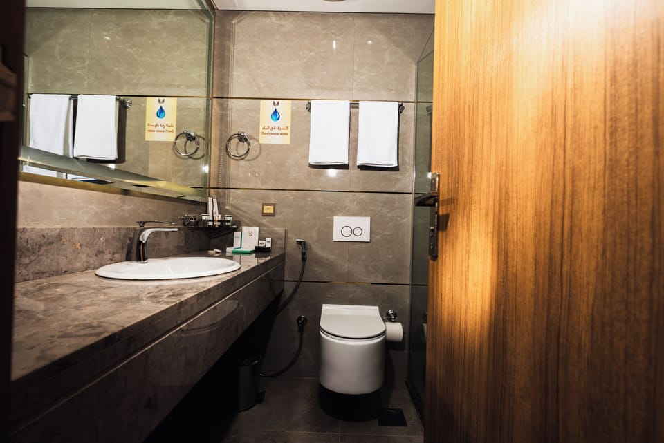 Hair dryer, slippers, towels, soap