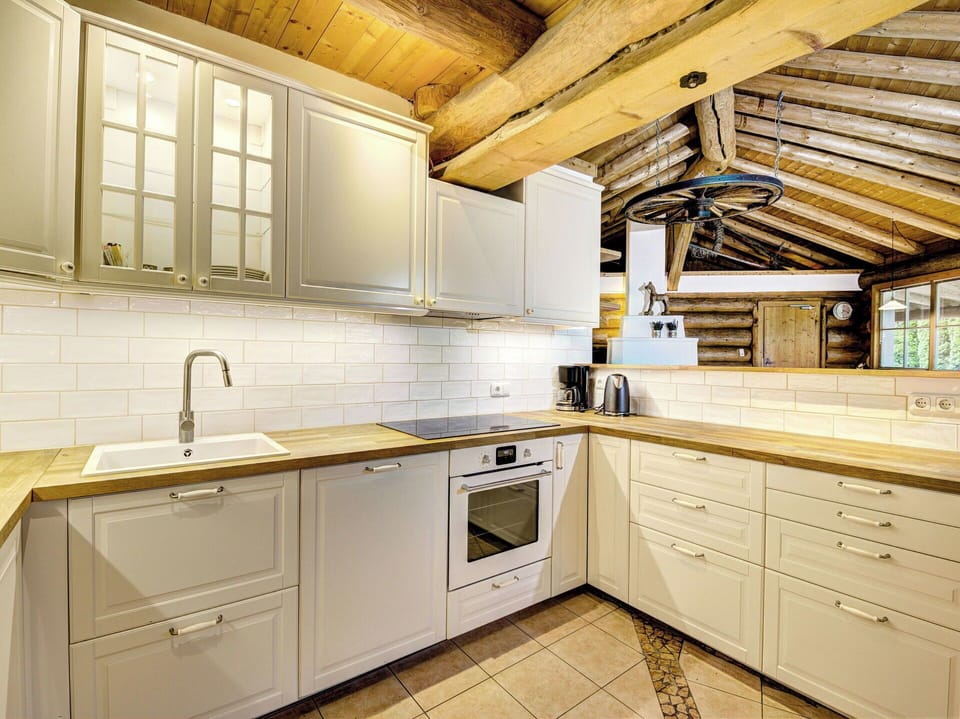 Kitchen, Countertop, Kitchen Appliance, Cabinetry, Flooring, Interior Design, Major Appliance, Wood, Sink, Ceiling