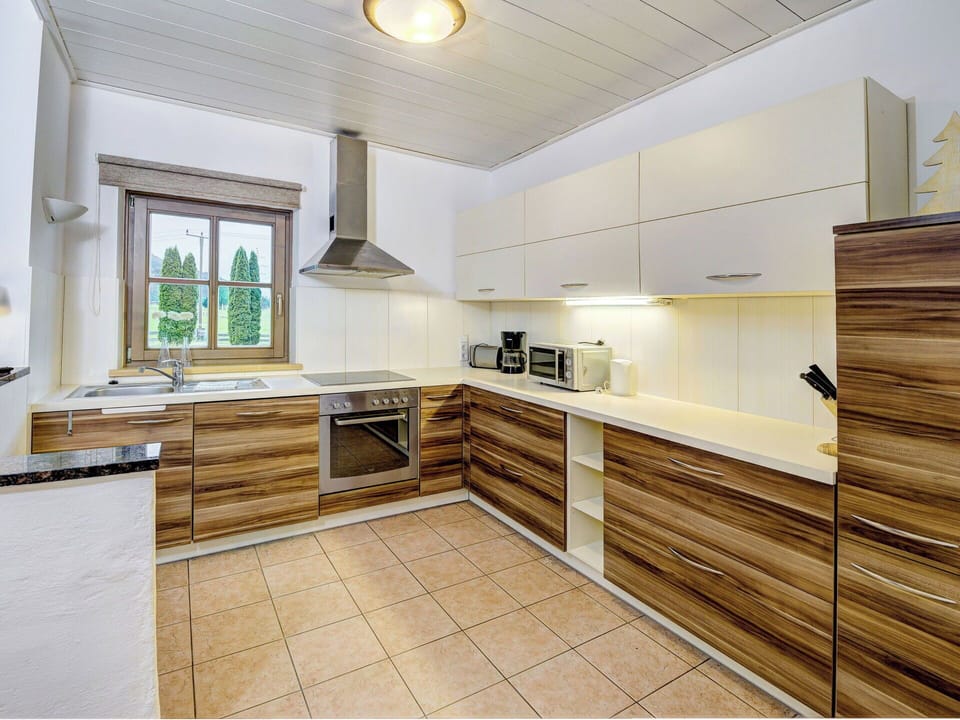 Furniture, Interior Design, Flooring, Floor, Table, Wood, Ceiling, Chair, Room, Couch