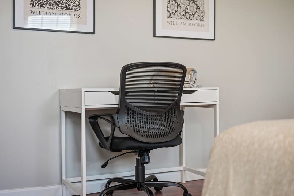 Dedicated workspace with sleek desk and ergonomic office chair
