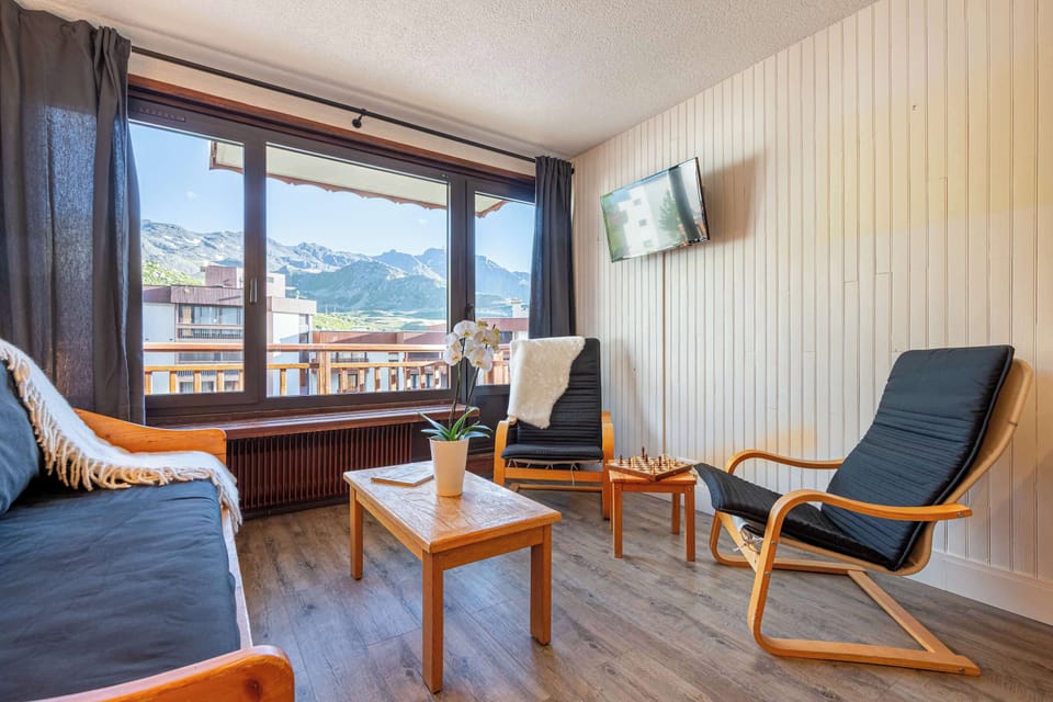 The Living Room Area Features a Comfortable Double Sofa Bed