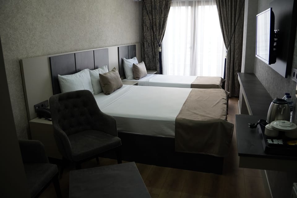Classic Double Room, Balcony | In-room safe, desk, laptop workspace, iron/ironing board (on request)