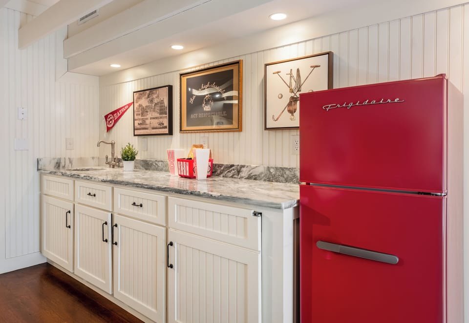 Enjoy a mini fridge and popcorn maker for easy snacking.