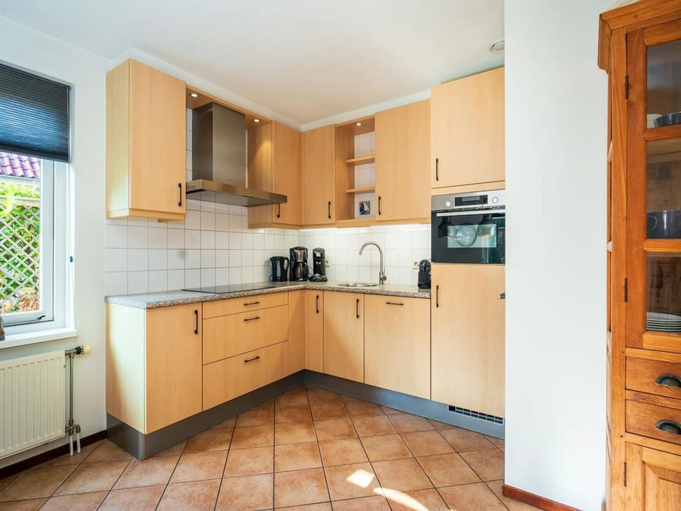 Villa | Private kitchen | Stovetop, highchair