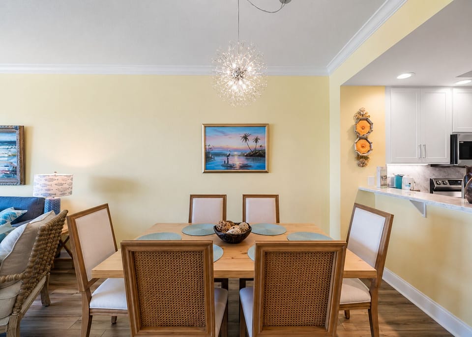 The dining table seats 6 for your meals... and game night!