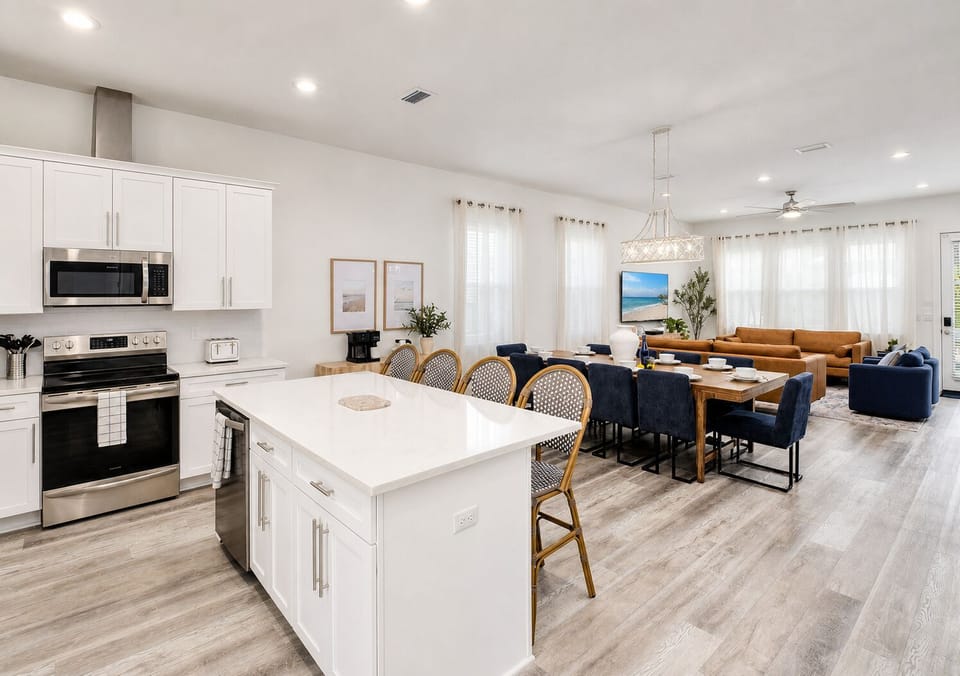 1st Floor - Open kitchen, dining, and living spaces keep everyone connected, with dining for 10, island seating for 4, and plenty of room for shared meals and group time.