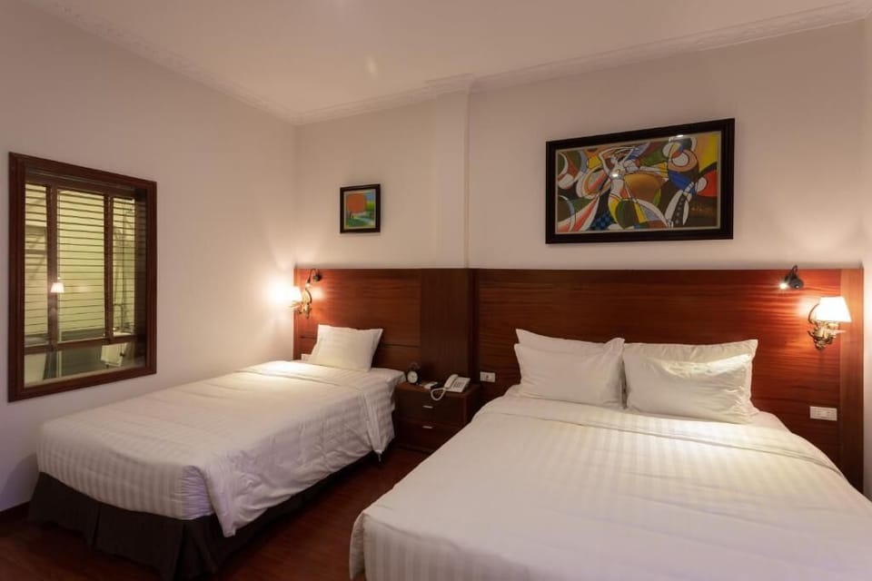 Family Room, City View | In-room safe, soundproofing, iron/ironing board, WiFi (free)