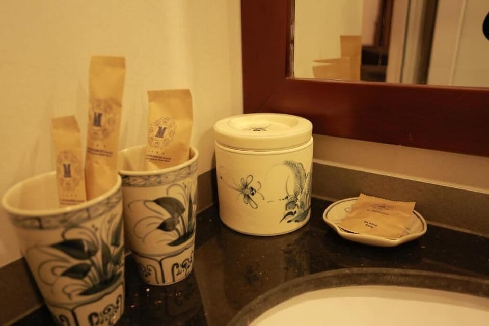 Deluxe Double Room, Balcony, City View | Bathroom amenities | Slippers