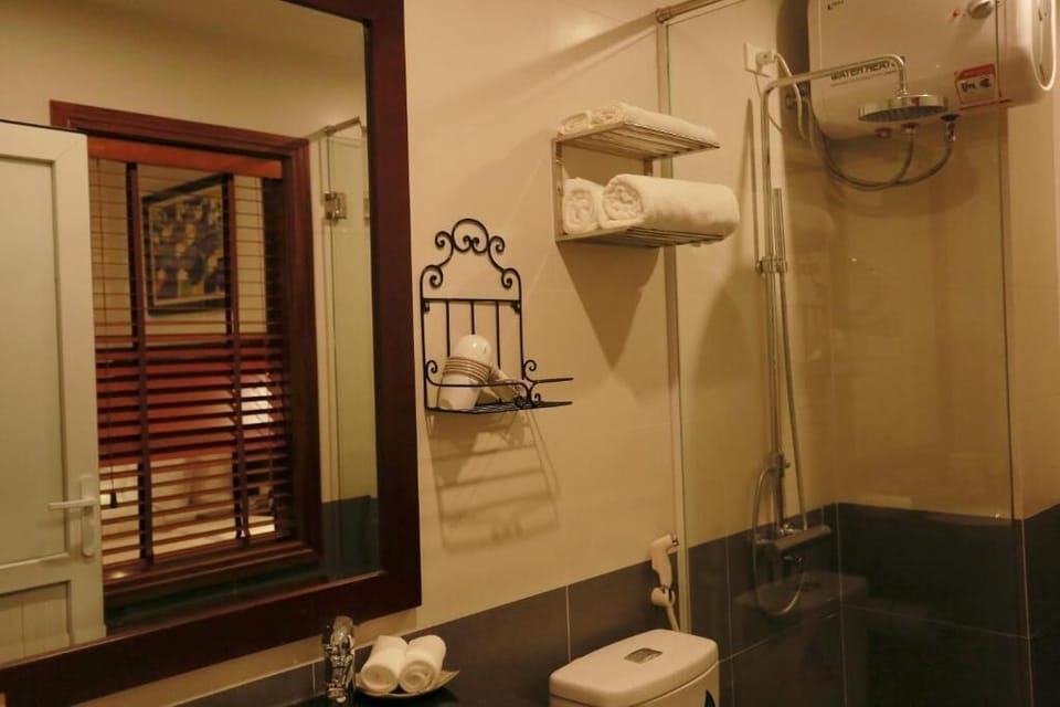 Deluxe Double Room, Balcony, City View | Bathroom | Slippers