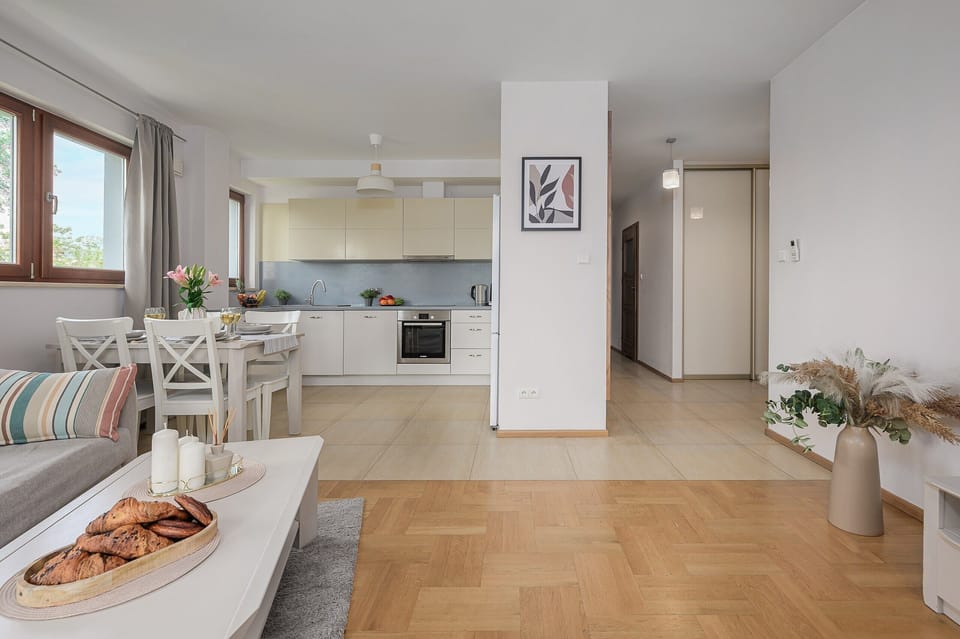 Deluxe Apartment, 2 Bedrooms, Courtyard View | Living area | 30-inch TV with satellite channels, Netflix, streaming services