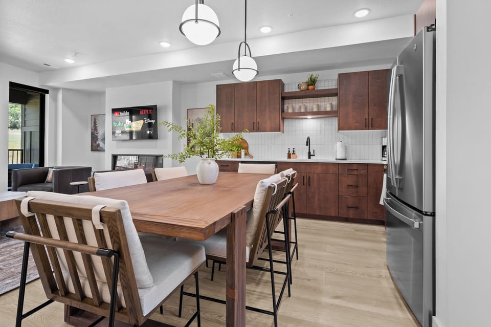 This well-equipped kitchen features a gas stove, dishwasher, microwave, and other appliances for your convenience and culinary enjoyment.