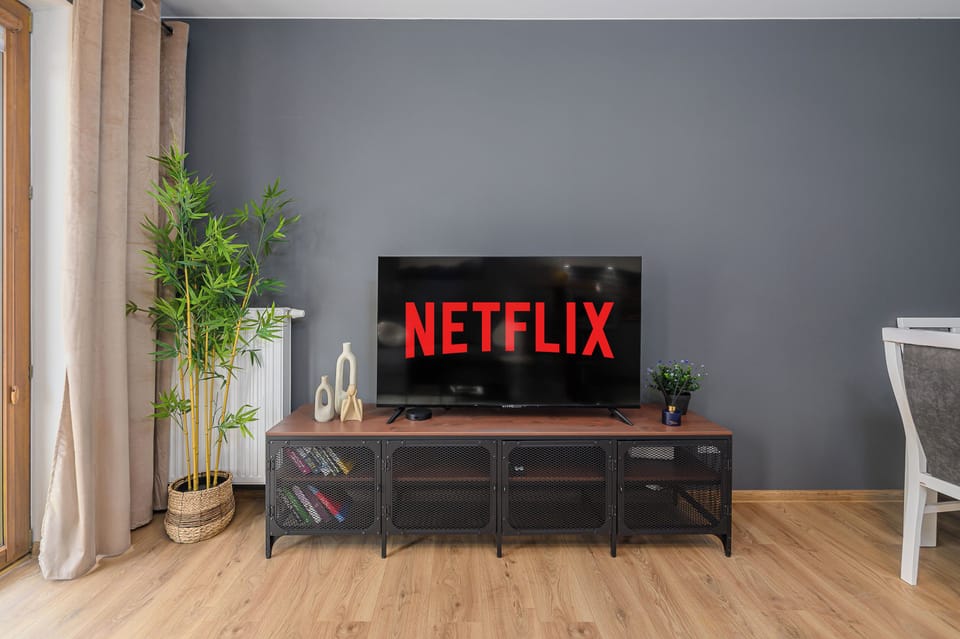 Deluxe Apartment, 2 Bedrooms, Courtyard View | Television