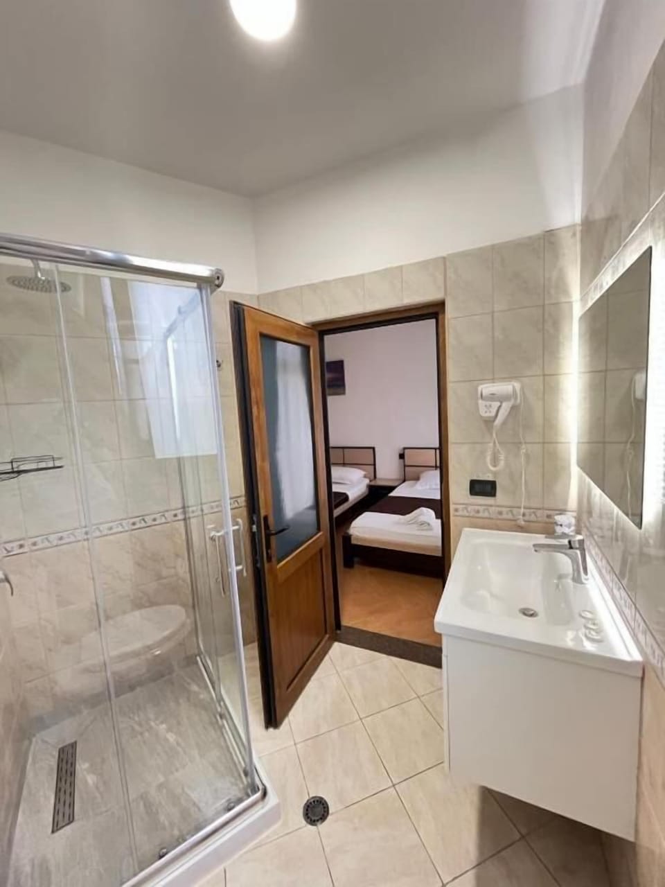 Standard Triple Room, Balcony, Lagoon View | Bathroom | Shower, hair dryer, towels, soap