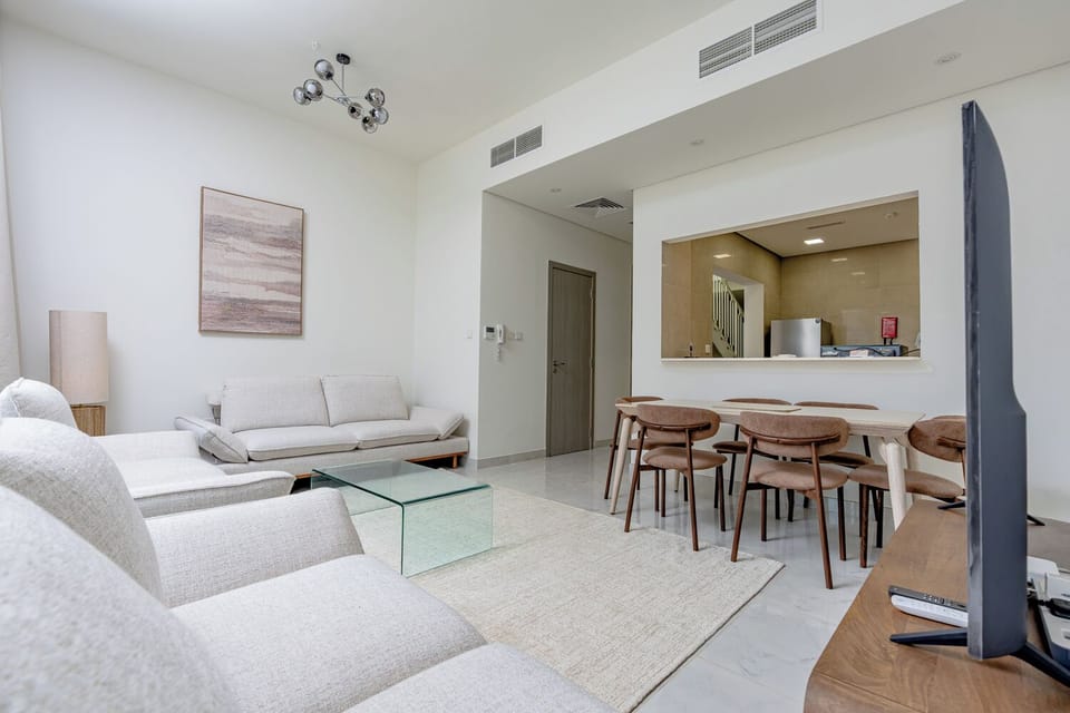Family House | Living area | 65-inch Smart TV with digital channels, Netflix, streaming services