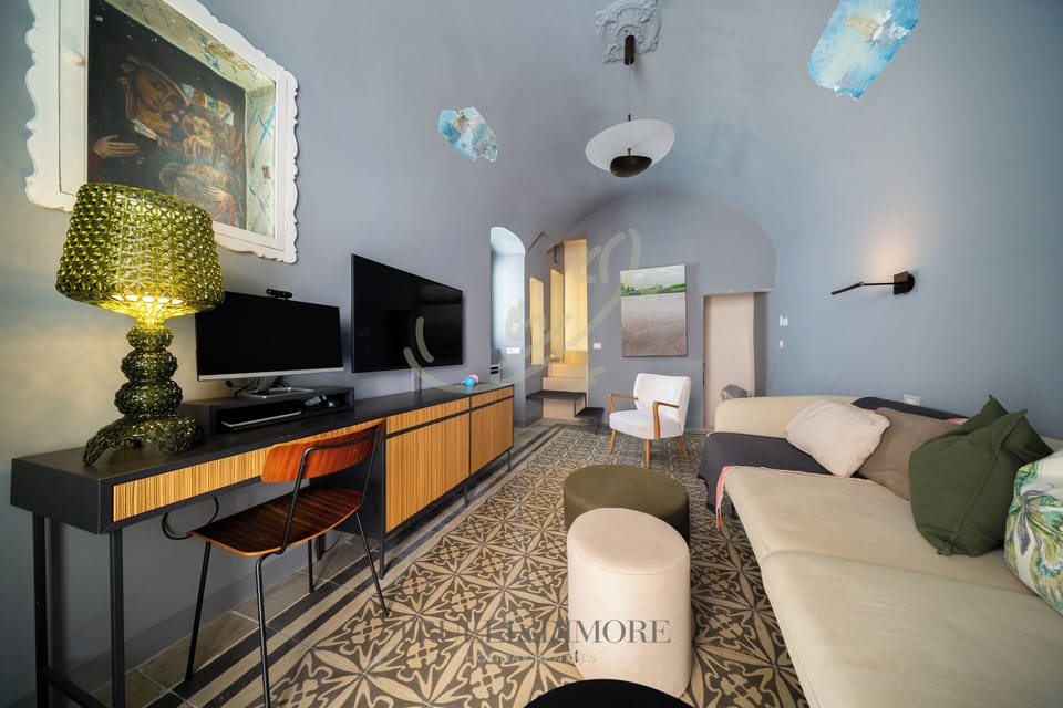 Apartment (2 Bedrooms) | Living area | 32-inch TV with cable channels