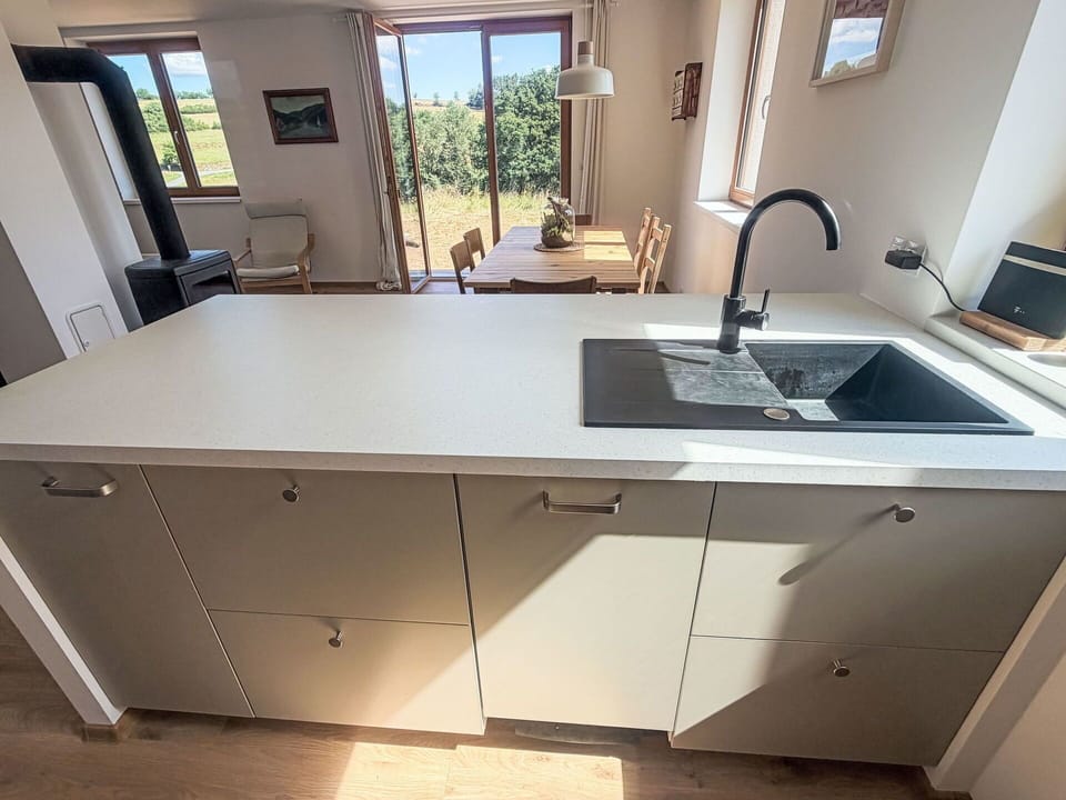 Kitchen, Flooring, Countertop, Floor, Cabinetry, Kitchen Sink, Sink, Plumbing Fixture, Interior Design, Tap