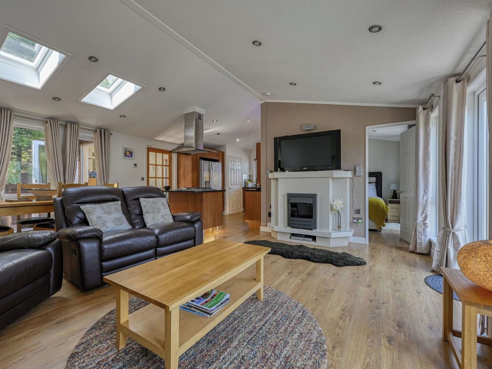 Furniture, Interior Design, Wood, Flooring, Ceiling, Floor, Couch, Home, Lighting, Living Room