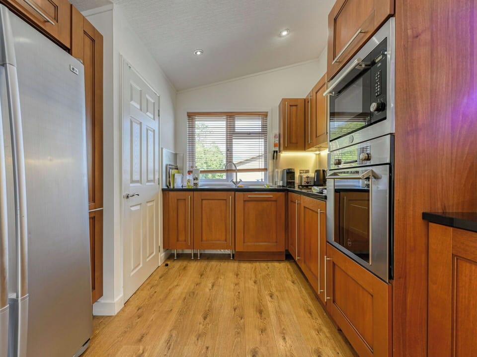 Kitchen, Kitchen Appliance, Cabinetry, Countertop, Flooring, Furniture, Major Appliance, Interior Design, Wood, Home Appliance