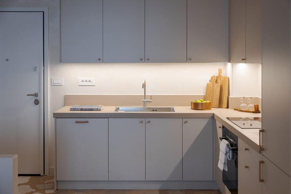 Deluxe Apartment | Private kitchen | Espresso maker, full-size fridge, microwave, oven