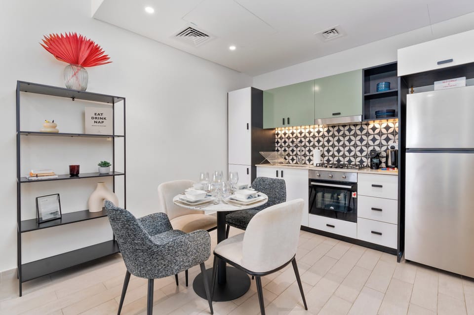 Deluxe Apartment, 2 Bedrooms, Balcony, Pool View | Private kitchen | Coffee/tea maker, full-size fridge, microwave, oven