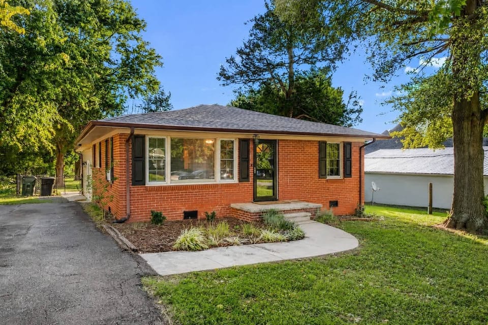 Classic brick ranch with private driveway
