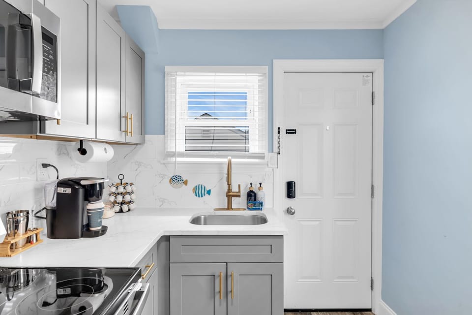 Bright modern kitchen with coffee station and stylish finishes