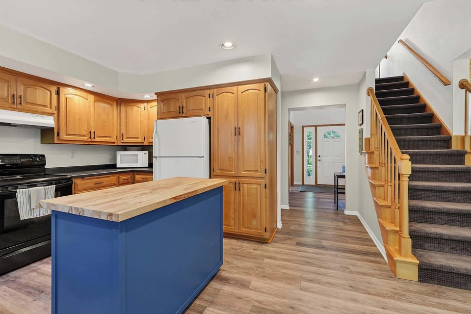 Well Appointed Kitchen boasts new island and updated cabinets