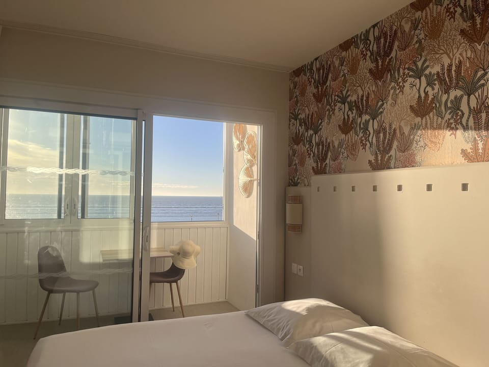 Double Room, Balcony, Sea View | Blackout drapes, free WiFi, bed sheets