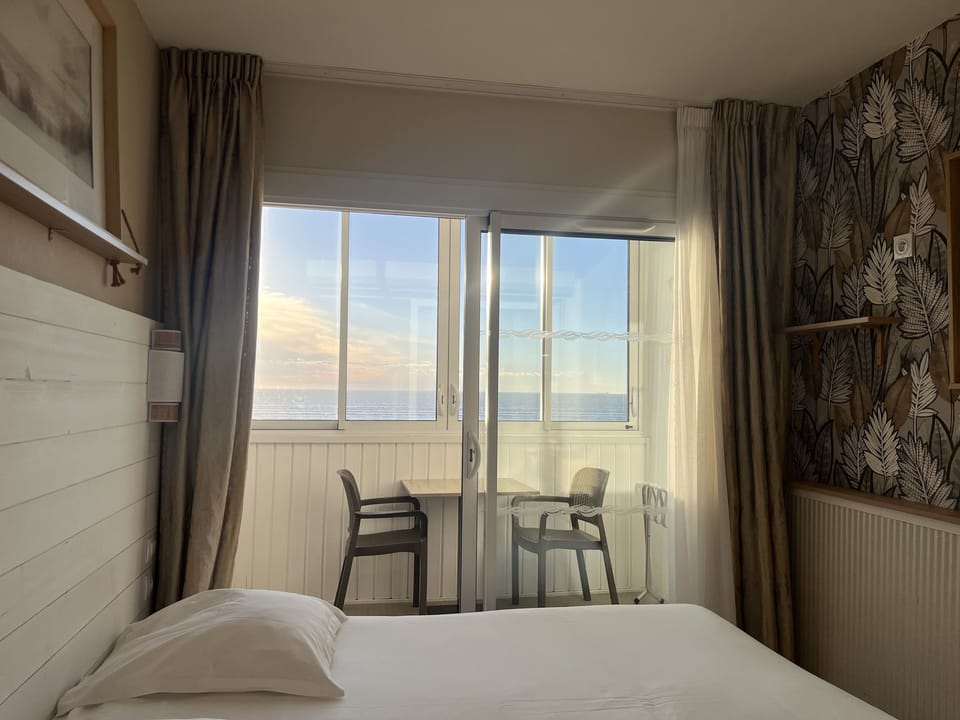 Double Room, Balcony, Sea View | Blackout drapes, free WiFi, bed sheets