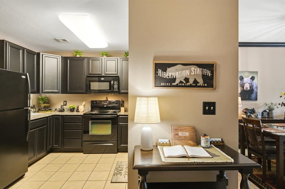 Cozy cabin-style kitchen with dining space and warm, welcoming decor