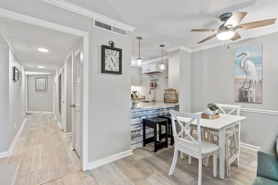 A charming dining area with a cozy table setup for a delightful mealtime experience.