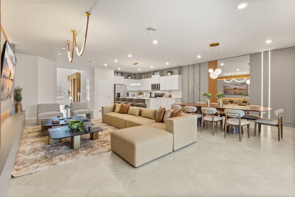 Experience luxury in this expansive open-plan living area with modern amenities and ample seating for gatherings.