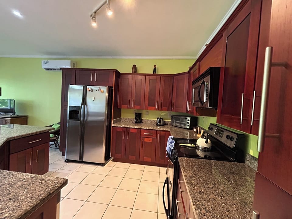 Beautiful large kitchen with granite countertops