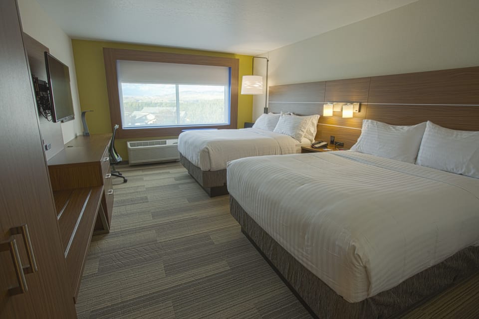 Egyptian cotton sheets, premium bedding, down comforters, in-room safe