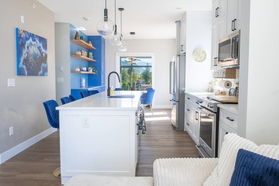 The large island provides plenty of room for cooking and conversation.