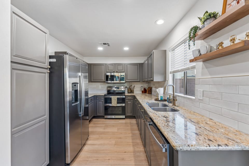 Stainless steel appliances and cooking essentials.