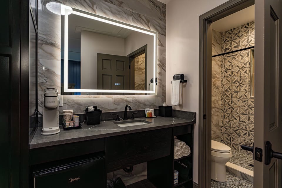 Double Room, 2 Queen Beds, Courtyard View | Bathroom | Shower, free toiletries, hair dryer, towels