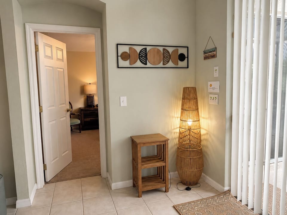 Décor by sliding door to pool deck.