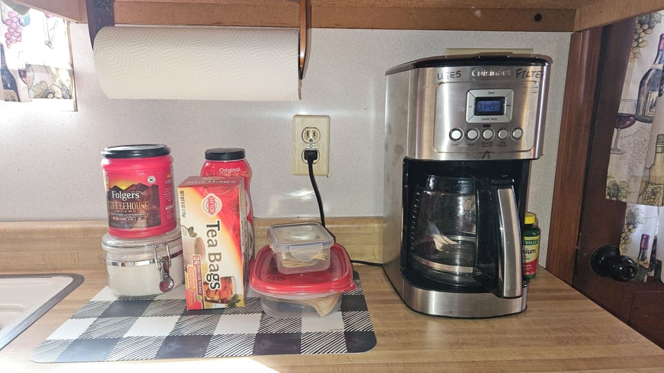 Coffee maker, coffee, tea, etc all provided.