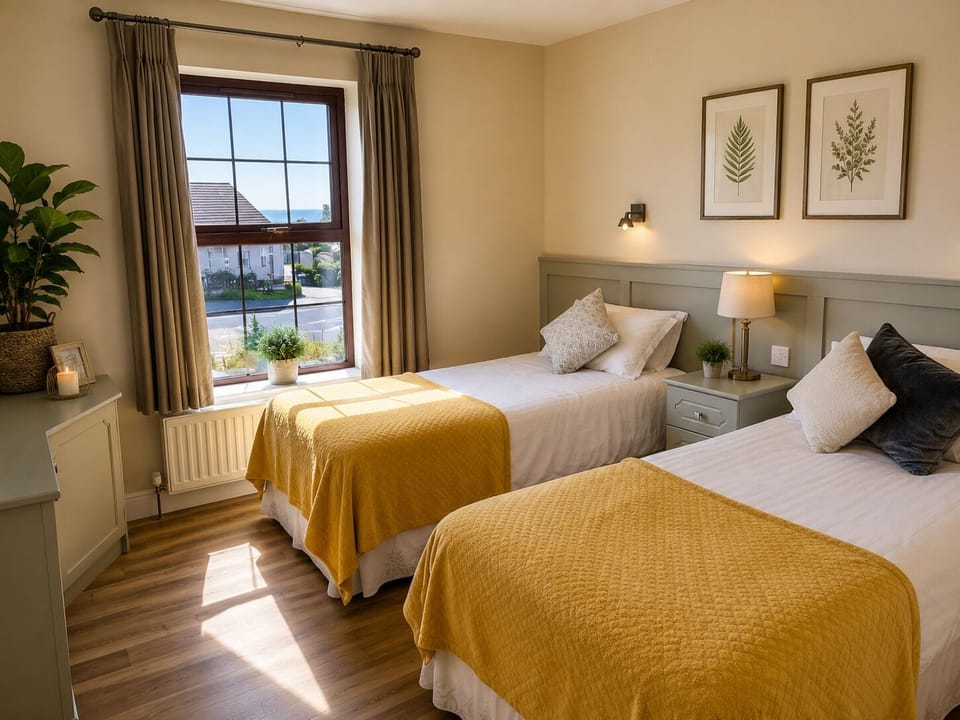 Premium bedding, desk, laptop workspace, blackout drapes
