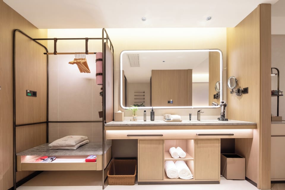 Comfort Twin Room | Bathroom | Shower, hair dryer, slippers, towels