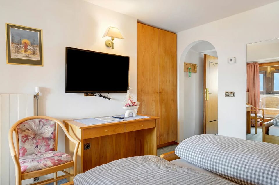 Basic Double Room, Balcony, City View | In-room safe, desk, laptop workspace, blackout drapes