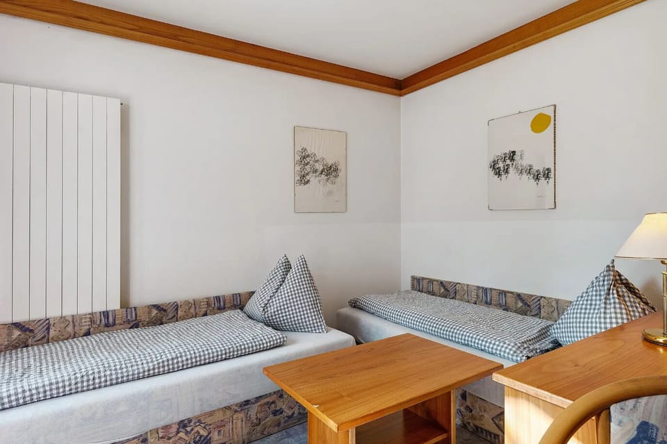 Classic Quadruple Room, City View | In-room safe, desk, laptop workspace, blackout drapes